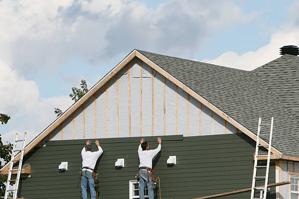 Professional Storm Damage Siding Repair technician working in Boswell, PA